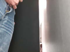 Public cum in front of woman in dressing room