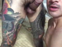 Asian sucking his whole-body tattooed friend (1'02'')