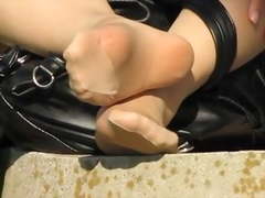 Nylon soles feet at the park in tokyo