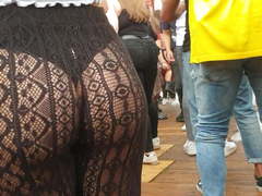 Girls dancing in see through fishnet pants at festival