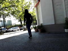 Shemale trans high heels walking on street