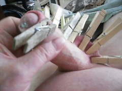 Clothespin Fun With Shaved Un-cut Cock