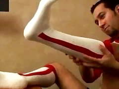 Cute Guy Shows Off Red OTC Stirrup Baseball Socks