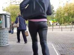 Casual woman's ass in leather pants