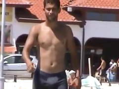 Hot sexy man bulging at beach