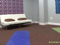 teen gymnast gets stretched by her trainer